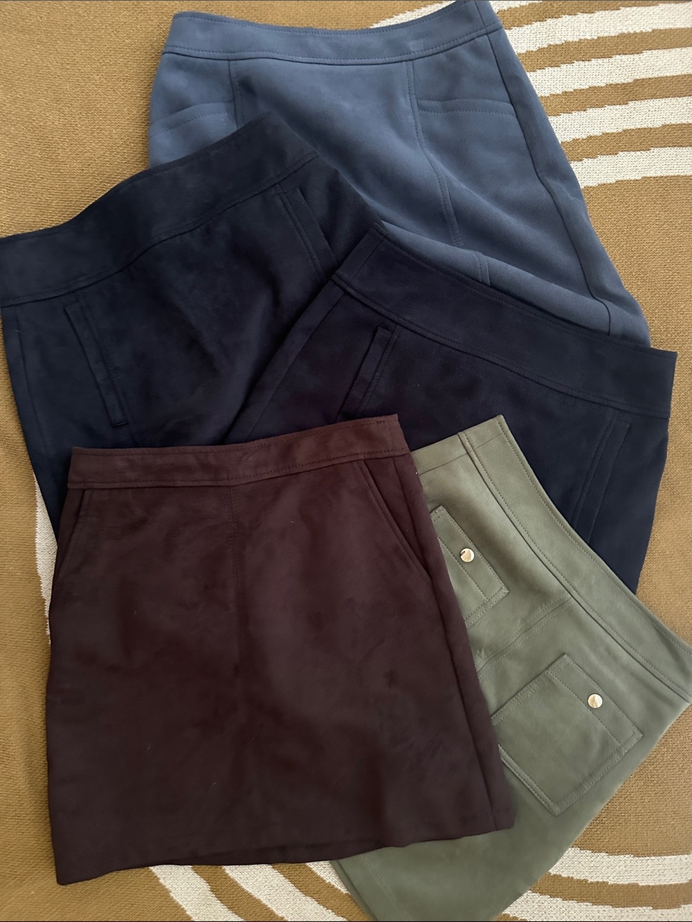 LOFT 5-Pack Suede-Look Skirts in Blue, Navy-Black (x2), Olive, and Brown